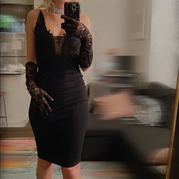 Black lace midi dress from Akira Black lace midi dress from Akira